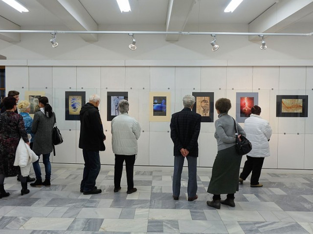 LIBOR SALÁK - fotografie; MILOSLAV ČEVELA - dřevěné reliéfy